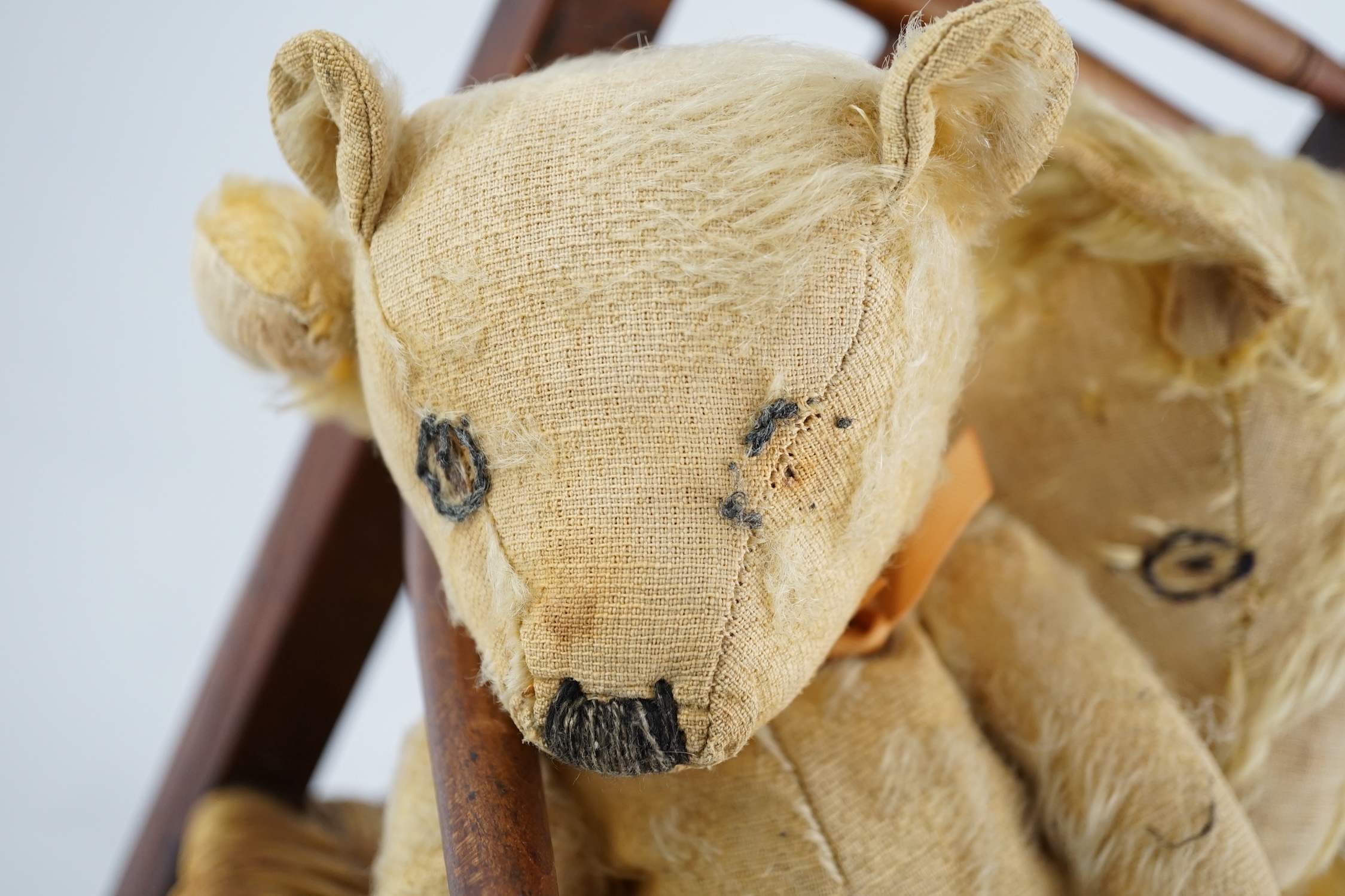 Two teddy bears and a child's chair